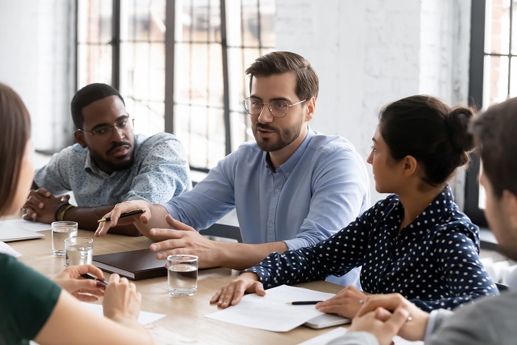 people talking in a team meeting