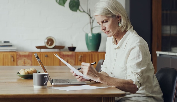 older woman working on taxes