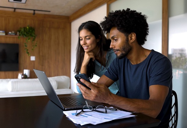 couple working together on laptop