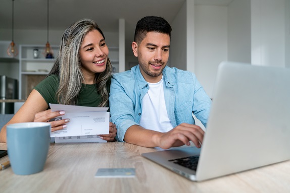 couple working on a laptop